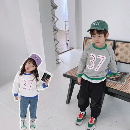 Children"s clothing wholesale autumn new children"s Round Neck Sweater Girl Baby 37 letter color matching Korean boys" sweater null