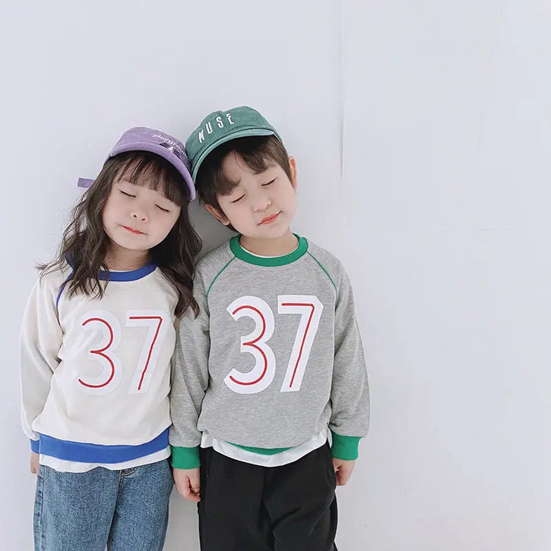 Children"s clothing wholesale autumn new children"s Round Neck Sweater Girl Baby 37 letter color matching Korean boys" sweater null