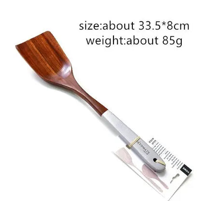 Colorful Kitchenware Wooden Spoons And Shovel null