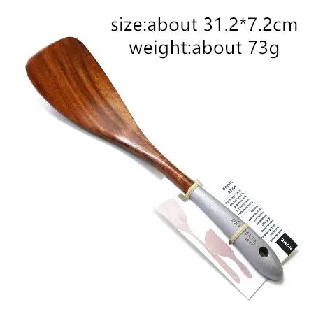 Colorful Kitchenware Wooden Spoons And Shovel null