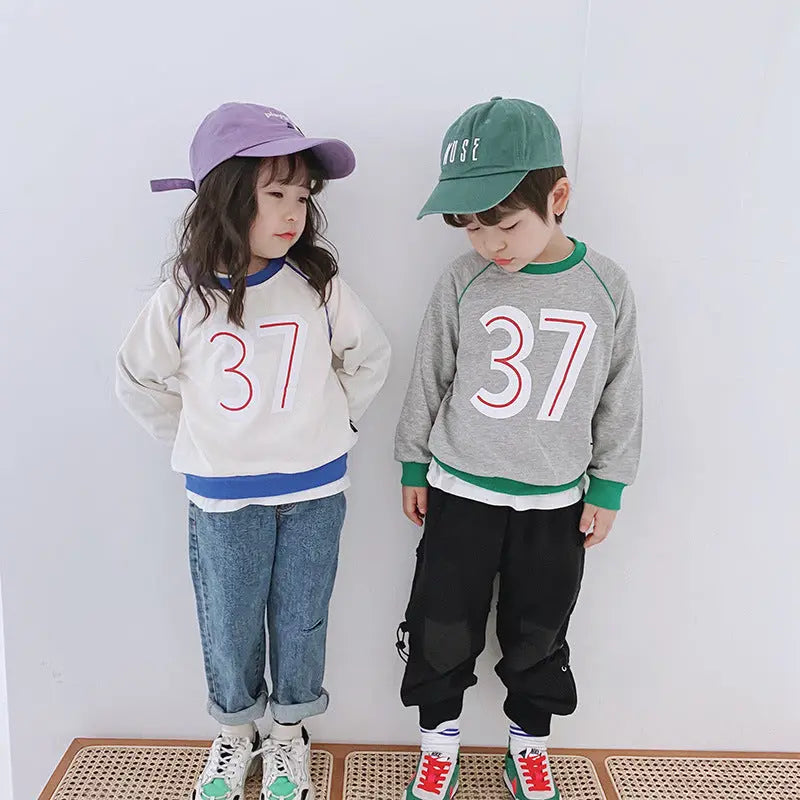 Children"s clothing wholesale autumn new children"s Round Neck Sweater Girl Baby 37 letter color matching Korean boys" sweater null